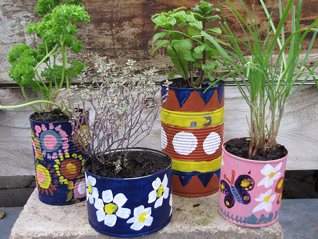 Decorated tin cans for plants Decorated tin cans for plants